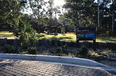 Mindarie Park view with informational sign