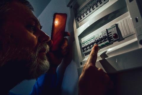 Man and junction box