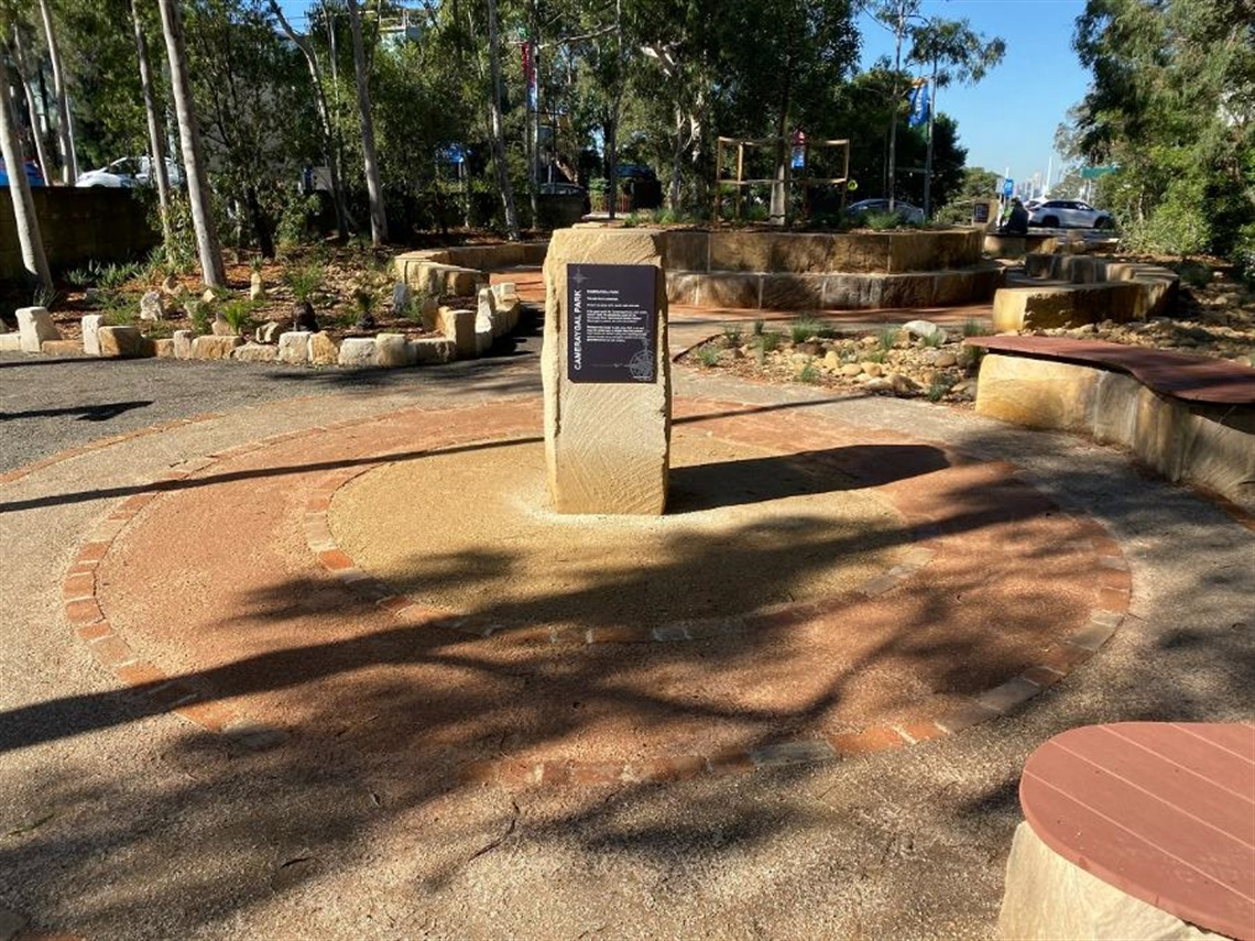 Sandstone plinth with interpretive sign 