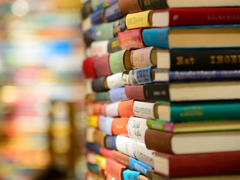 stack of colourful books