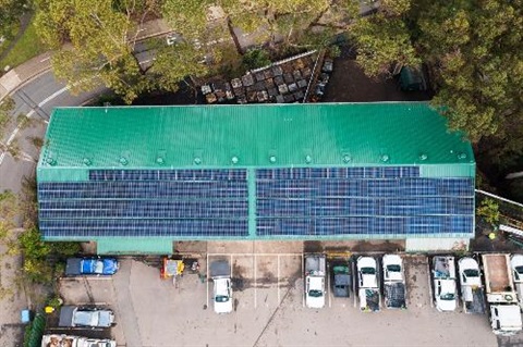 Drone image of the Council Depot with a green roof covered with solar panels