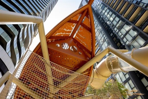 Looking up at the playground structure at Friedlander Place